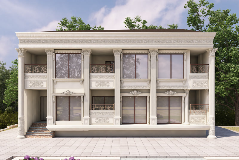 İki katlı müstakil bir villanın ön cephesinde yer alan dekoratif dairesel sütunlar, işlemeli balkon panelleri ve klasik pencere söveleri.