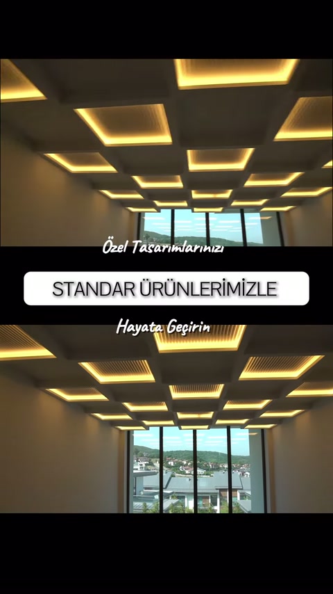 Izgaralı ve çerçeveli aydınlatma modülleri tavanda dengeli biçimde yerleşiyor