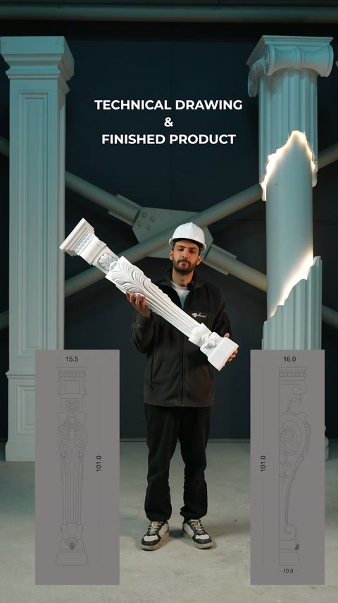 Atölyede uzun dekoratif pilaster parçası teknik çizimler arasında taşınıyor